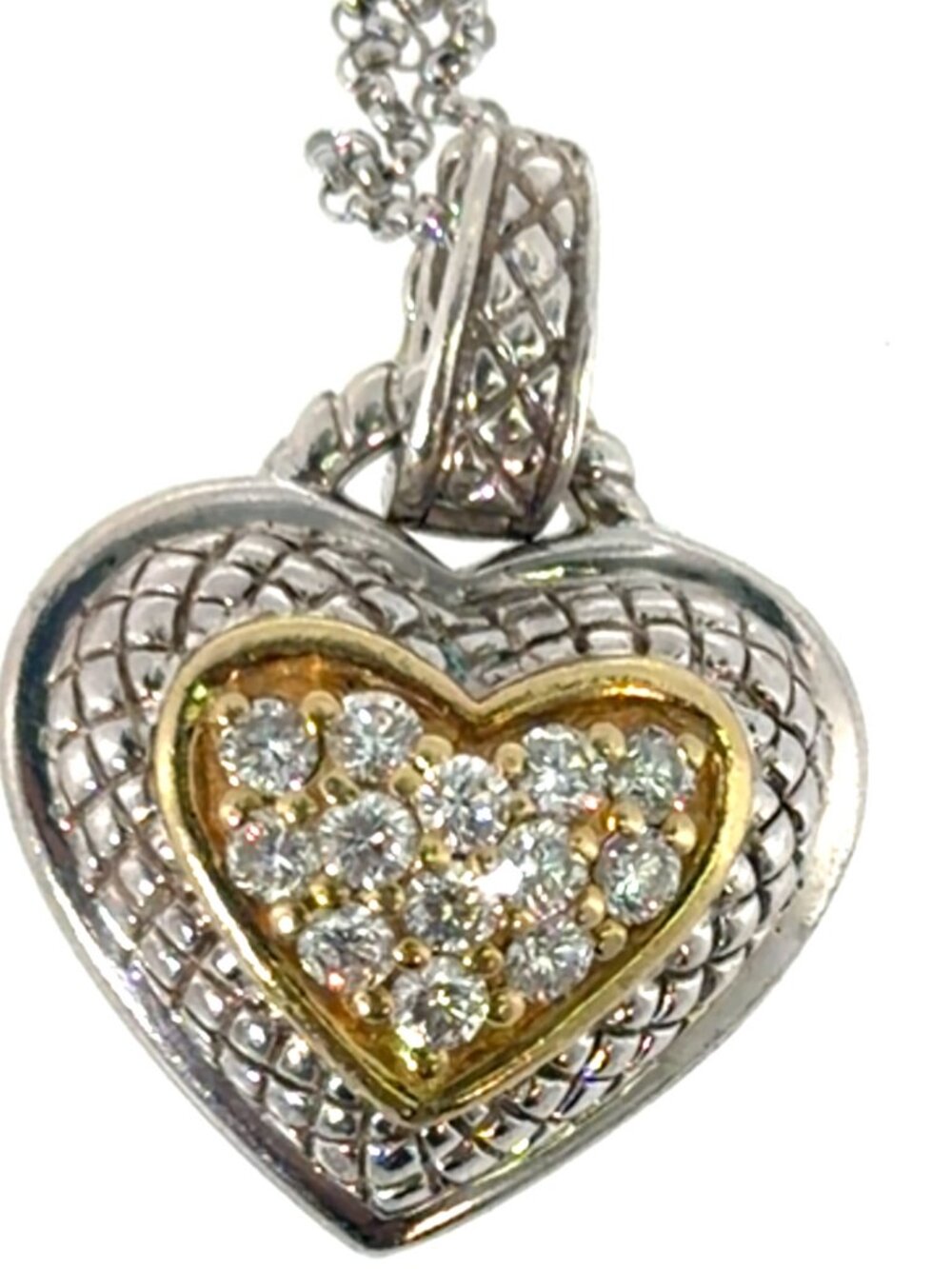 Silver,gold and diamond heart pendant